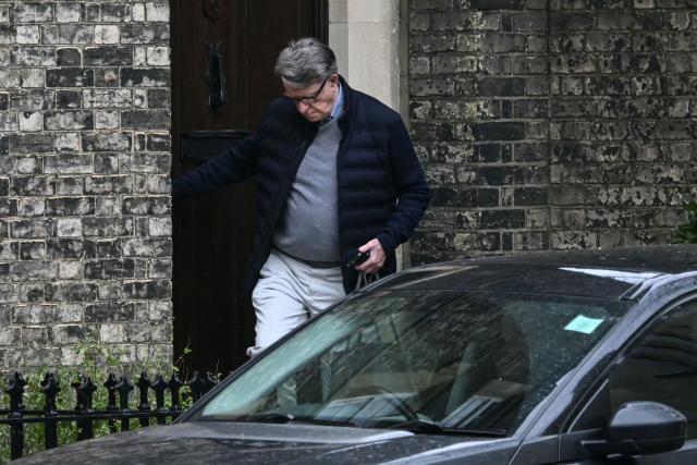 (FILES) Former UK ambassador to the United States, Peter Mandelson, is pictured as he leaves his residence in central London on February 21, 2026. Mandelson was on February 23, 2026 arrested on suspicion of misconduct in public office. (Photo by JUSTIN TALLIS / AFP)