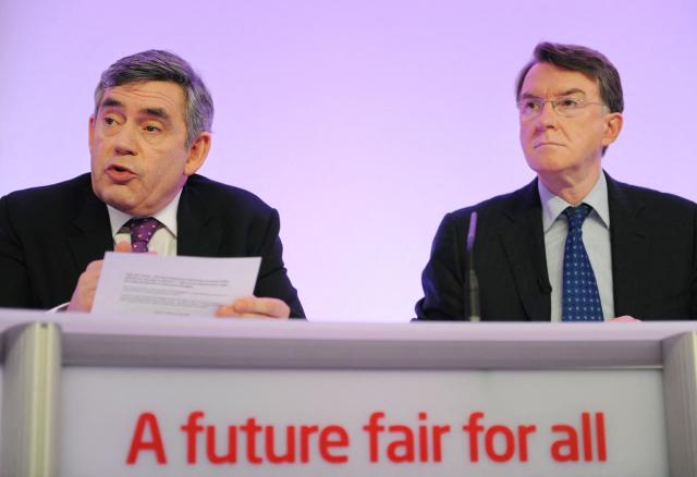(FILES) British Prime Minister Gordon Brown (L) and Business Secretary Lord Peter Mandelson attend a press conference in London, on April 8, 2010. Police on February 23, 2026 arrested former British ambassador to the United States Peter Mandelson in a misconduct in public office probe, amid allegations over his ties to disgraced US financier Jeffrey Epstein. "Officers have arrested a 72-year-old man on suspicion of misconduct in public office," the Metropolitan police said in a statement, following previous searches of Mandelson's home and as broadcast footage appeared to show Mandelson being driven away from his home. (Photo by Ben STANSALL / AFP)