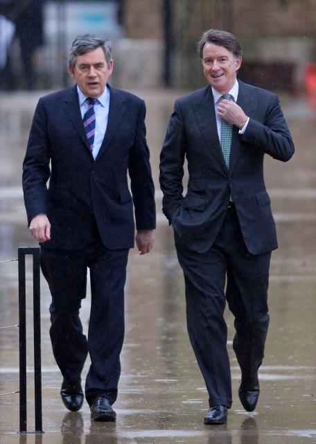 (FILES) British Prime Minister Gordon Brown (L) and Business Secretary Peter Mandelson arrive at the Global Investment Conference in central London, on February 22, 2010. Police on February 23, 2026 arrested former British ambassador to the United States Peter Mandelson in a misconduct in public office probe, amid allegations over his ties to disgraced US financier Jeffrey Epstein. "Officers have arrested a 72-year-old man on suspicion of misconduct in public office," the Metropolitan police said in a statement, following previous searches of Mandelson's home and as broadcast footage appeared to show Mandelson being driven away from his home. (Photo by Carl COURT / AFP)
