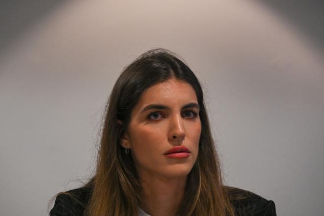 (FILES) Camilla Fabri, the wife of Colombian businessman Alex Saab, who was extradited to the US on money laundering charges, attends a press conference at the Melia hotel in Caracas on March 16, 2023. Camilla Fabri de Saab, wife of Alex Saab, who has been accused of being a front man for Nicolas Maduro, was removed from the position she held in the Venezuelan government amid a new cabinet reshuffle by interim president Delcy Rodriguez. (Photo by Federico PARRA / AFP)
