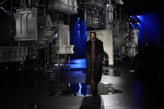 A model presents a creation during a catwalk presentation for Burberry's Autumn/Winter 2026 collection, during London Fashion Week in London on February 23, 2026. (Photo by Toby Shepheard / AFP)