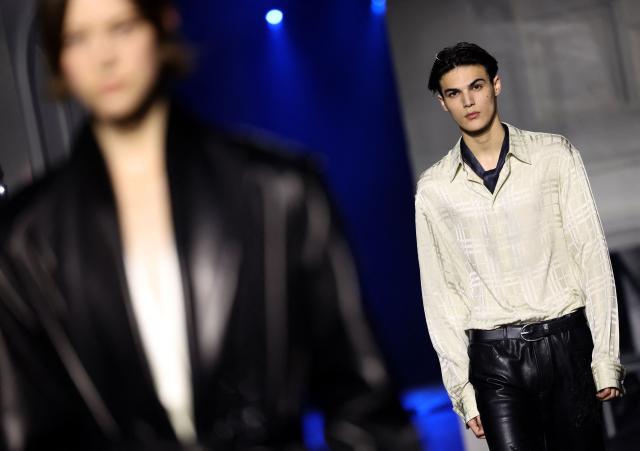 Models present creations during a catwalk presentation for Burberry's Autumn/Winter 2026 collection, during London Fashion Week in London on February 23, 2026. (Photo by Toby Shepheard / AFP)