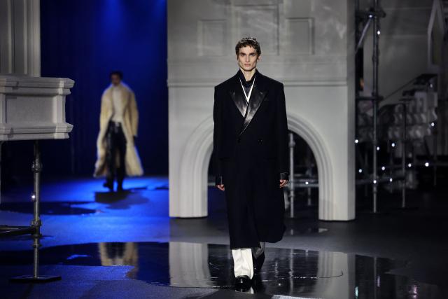 Models present creations during a catwalk presentation for Burberry's Autumn/Winter 2026 collection, during London Fashion Week in London on February 23, 2026. (Photo by Toby Shepheard / AFP)