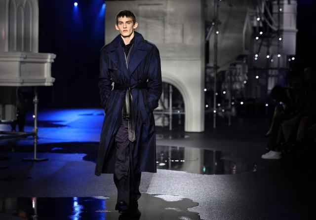 A model presents a creation during a catwalk presentation for Burberry's Autumn/Winter 2026 collection, during London Fashion Week in London on February 23, 2026. (Photo by Toby Shepheard / AFP)