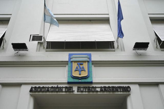 (FILES) (FILES) View of the Argentine Football Association (AFA) headquarters, where Federal Police are raiding in Buenos Aires on December 9, 2025. Argentine club leaders asked on February 23, 2026 the Argentine Football Association (AFA) to suspend the ninth round of the Apertura tournament in "repudiation" of a legal complaint alleging tax evasion against leaders of the organisation, including president Claudio "Chiqui" Tapia. (Photo by JUAN MABROMATA / AFP)