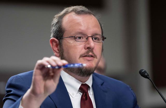 UFormer US Immigration and Customs Enforcement instructor responsible for educating new ICE officers, Ryan Schwank, speaks during a forum on Immigration and Customs Enforcement (ICE) at the Dirksen Senate Office Building at the US Capitol on February 23, 2026 in Washington, DC. (Photo by ANDREW CABALLERO-REYNOLDS / AFP)