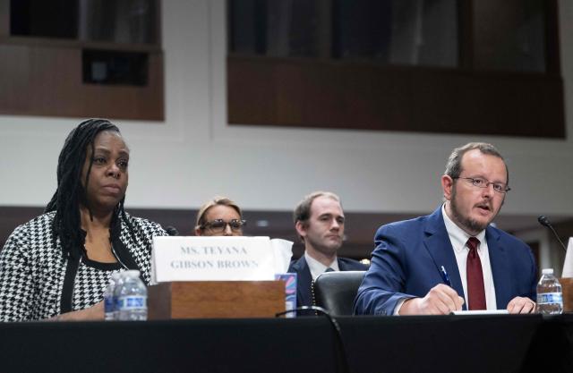 Former US Immigration and Customs Enforcement instructor responsible for educating new ICE officers, Ryan Schwank, speaks as Teyana Gibson Brown (L) looks on during a forum on Immigration and Customs Enforcement (ICE) at the Dirksen Senate Office Building at the US Capitol on February 23, 2026 in Washington, DC. (Photo by ANDREW CABALLERO-REYNOLDS / AFP)