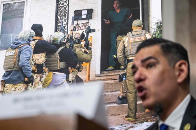 US House Oversight and Government Reform Committee ranking member Representative Robert Garcia, Democrat of California, speaks in front of a picture of Teyana Gibson Brown, a resident of Minneapolis, Minnesota, confronting federal agents as they raid her home during a forum on Immigration and Customs Enforcement (ICE) at the Dirksen Senate Office Building at the US Capitol on February 23, 2026 in Washington, DC. (Photo by ANDREW CABALLERO-REYNOLDS / AFP)