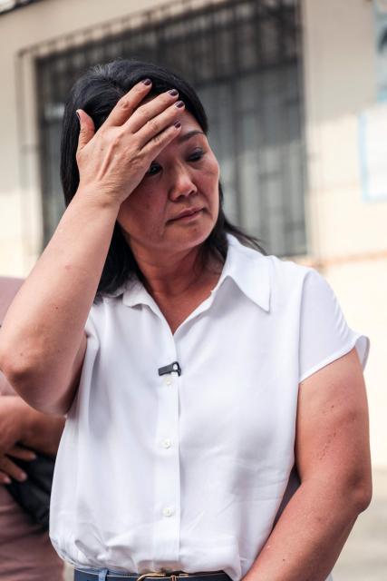 Peruvian presidential candidate of the People's Force party, Keiko Fujimori, gestures during a campaign event at Valle Alto health centre in Lima on February 23, 2026. Peru will hold a presidential election on April 12, 2026. (Photo by Connie FRANCE / AFP)
