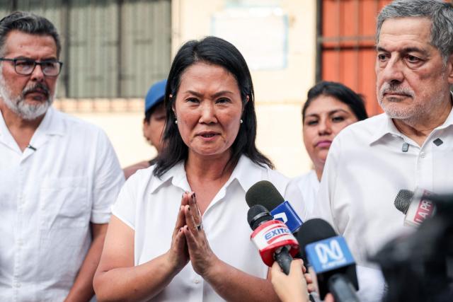 Peruvian presidential candidate of the People's Force party, Keiko Fujimori, speaks to the press during a campaign event at Valle Alto health centre in Lima on February 23, 2026. Peru will hold a presidential election on April 12, 2026. (Photo by Connie FRANCE / AFP)