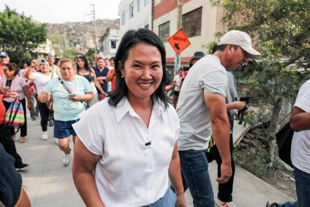 Peruvian presidential candidate of the People's Force party, Keiko Fujimori, smiles during a campaign event at Valle Alto health centre in Lima on February 23, 2026. Peru will hold a presidential election on April 12, 2026. (Photo by Connie FRANCE / AFP)