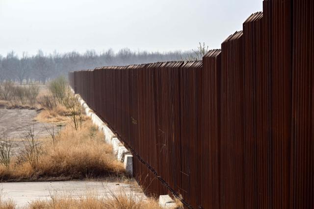 The US-Mexico border wall is pictured in the outskirts of Eagle Pass, Texas, on February 19, 2026. (Photo by RONALDO SCHEMIDT / AFP)