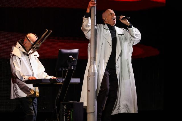British singer Neil Tennant (R) and keyboardist Chris Lowe (L), of synth-pop duo Pet Shop Boys, perform on stage during the 65th Vina del Mar International Song Festival in Vina del Mar, Chile on February 23, 2025. (Photo by Javier TORRES / AFP)