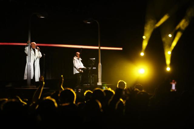 British singer Neil Tennant (L) and keyboardist Chris Lowe (R), of synth-pop duo Pet Shop Boys, perform on stage during the 65th Vina del Mar International Song Festival in Vina del Mar, Chile on February 23, 2025. (Photo by Javier TORRES / AFP)