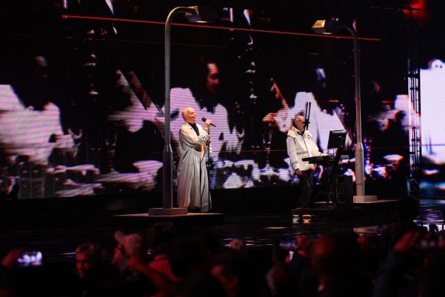 British singer Neil Tennant (L) and keyboardist Chris Lowe (R), of synth-pop duo Pet Shop Boys, perform on stage during the 65th Vina del Mar International Song Festival in Vina del Mar, Chile on February 23, 2025. (Photo by Javier TORRES / AFP)