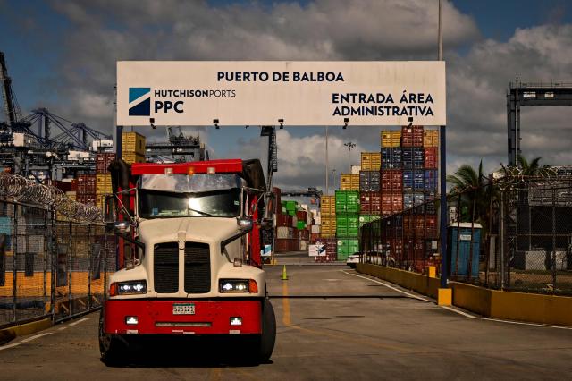 (FILES) A lorry leaves the main entrance of the port of Balboa in Panama City on January 30, 2026. Hong Kong-based conglomerate CK Hutchison objected on February 24, 2026 to a takeover by Panamanian authorities of two ports its subsidiary previously controlled on the Panama Canal. (Photo by MARTIN BERNETTI / AFP)