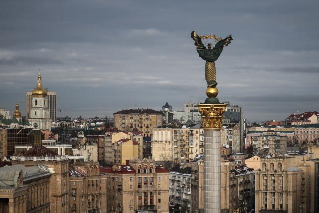 This photograph shows the Independence Monument towers over Independence Square in Kyiv on February 24, 2026, as Ukraine marks the fourth anniversary of Russia's full-scale invasion. (Photo by HENRY NICHOLLS / AFP)