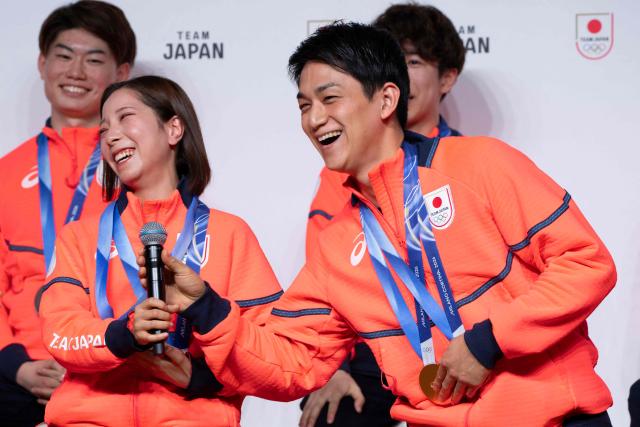 Milano Cortina 2026 Winter Olympic Games gold medallists in the figure skating event Japan's Riku Miura (L) and Ryuichi Kihara (R) attend a press conference in Tokyo on February 24, 2026. (Photo by Yuichi YAMAZAKI / AFP)
