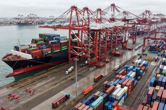 Gargo containers are seen at a port in Qingdao, eastern China's Shandong province on February 24, 2026. (Photo by CN-STR / AFP) / China OUT