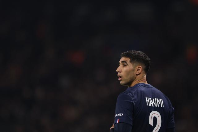 (FILES) Morocco's defender #02 Achraf Hakimi reacts  during the UEFA Champions League - League phase, Matchday 8 - football match between Paris Saint-Germain (PSG) and Newcastle United FC at the Parc des Princes stadium in Paris on January 28, 2026. Moroccan international and PSG football player Achraf Hakimi is being sent back to trial for the rape of a young woman in February 2023, AFP learned on February 24, 2026 from the player's lawyer and the Nanterre public prosecutor's office. (Photo by FRANCK FIFE / AFP)