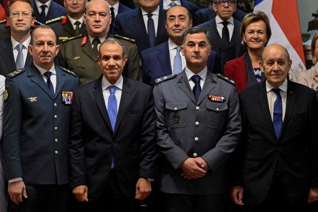 (From left) Commander of Lebanon's Armed Forces Major General Rodolphe Haykal, Egyptian Foreign Minister Badr Abdelatty, commander of Lebanon's Internal Security Forces Major General Raed Abdullah and French envoy Jean-Yves Le Drian pose for a group photo with representatives of participating countries during the preparatory meeting for the international conference in support of the Lebanese Armed Forces (LAF) and the Internal Security Forces (ISF) in Cairo on February 24, 2026. (Photo by Khaled DESOUKI / AFP)