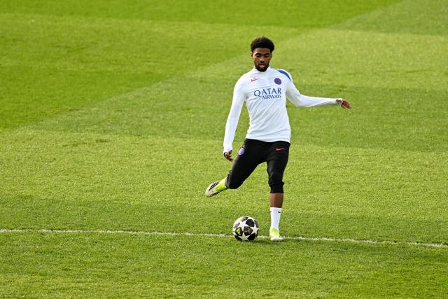 Paris Saint-Germain's French forward #49 Ibrahim Mbaye kicks the ball during a training session at the Campus Paris Saint-Germain in Poissy, in the western outskirts of Paris on February 24, 2026, on the eve of the UEFA Champions League play-off second leg football match between Paris Saint-Germain and AS Monaco. (Photo by Anna KURTH / AFP)
