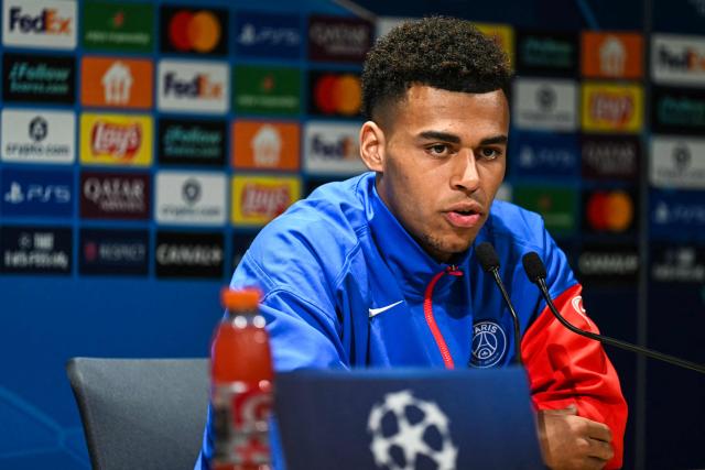 Paris Saint-Germain's French midfielder #14 Desire Doue speaks during a press conference at the Campus Paris Saint-Germain in Poissy, in the western outskirts of Paris on February 24, 2026, on the eve of the UEFA Champions League play-off second leg football match between Paris Saint-Germain and AS Monaco. (Photo by Anna KURTH / AFP)