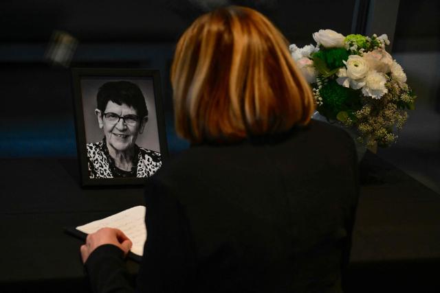 Former State Premier of the western federal state of Rhineland-Palatinate Malu Dreyer makes an entry in a condolence book during a commemoration ceremony for late former Bundestag President Rita Suessmuth at the Bundestag (lower house of parliament) in Berlin, on February 24, 2026. (Photo by John MACDOUGALL / AFP)