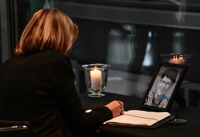 Former State Premier of the western federal state of Rhineland-Palatinate Malu Dreyer makes an entry in a condolence book during a commemoration ceremony for late former Bundestag President Rita Suessmuth at the Bundestag (lower house of parliament) in Berlin, on February 24, 2026. (Photo by John MACDOUGALL / AFP)