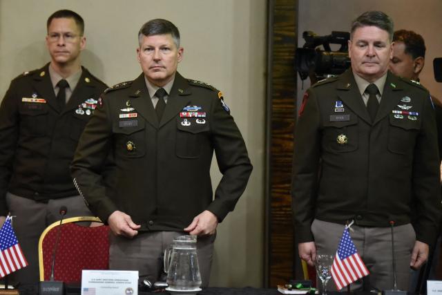 The commanding general of the U.S. Army Western Hemisphere Command, Joseph A. Ryan (C), and the Commander-in-Chief of the Southern Command of the United States Army, Philip J. Ryan (R), attend the opening of the XXXVII Cycle (2026–2027) of the Conference of American Armies (CAA) in Asuncion, on February 24, 2026. (Photo by Daniel Duarte / AFP)