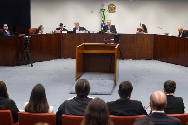 Plenary session of the first chamber of the Brazilian Supreme Court during the first session of the trial of those suspected of ordering the assassination of Brazilian councilwoman Marielle Franco in 2018, at the Supreme Federal Court in Brasília, on February 24, 2026. (Photo by Sergio Lima / AFP)