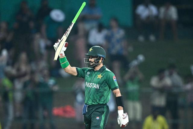 Pakistan's Sahibzada Farhan celebrates his half-century (50 runs) during the 2026 ICC Men's T20 Cricket World Cup Super Eights match between England and Pakistan at the Pallekele International Cricket Stadium in Kandy on February 24, 2026. (Photo by Dibyangshu SARKAR / AFP)