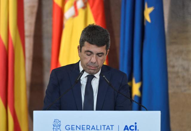 (FILES) President of Valencia's Region Carlos Mazon gives a press conference to announce his resignation at Valencia's Palau de la Generalitat on November 3, 2025. The judge investigating the floods that in 2024 left 230 dead in the Spanish region of Valencia requested on February 24, 2026 the indictment of former regional president Carlos Mazon, who resigned in November and was widely criticized by the families of the victims. (Photo by Jose JORDAN / AFP)