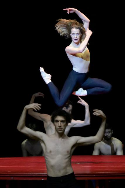 Dancers from 'Bejart Ballet Lausanne' (BBL) of Switzerland perform during a rehearsal of "Bolero", choregraphed by Maurice Bejart to the music of Maurice Ravel, as part of the three unique ballets brought together at Zorlu Performing Arts Center (PSM) in Istanbul on February 21, 2026. (Photo by Yasin AKGUL / AFP)