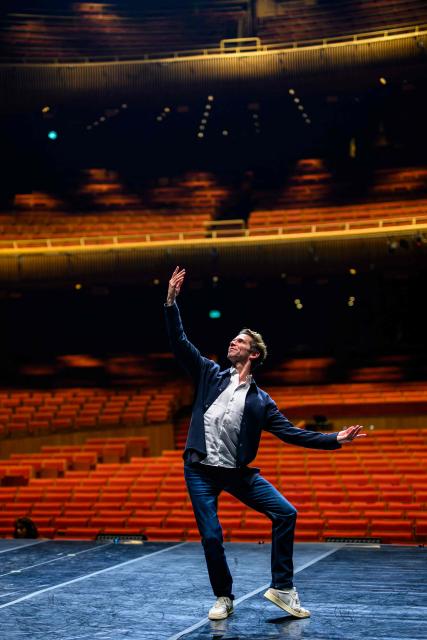 Julien Favreau, artistic director of the 'Bejart Ballet Lausanne' (BBL) of Switzerland, poses during an interview on the sidelines of the three unique ballets brought together at Zorlu Performing Arts Center (PSM) in Istanbul on February 20, 2026. Thirty-six dancers with raised arms glide slowly forward as they encircle their prey, a lone figure on a red table in a climactic scene from Ravel's "Bolero" choreographed by Maurice Bejart. (Photo by Yasin AKGUL / AFP)