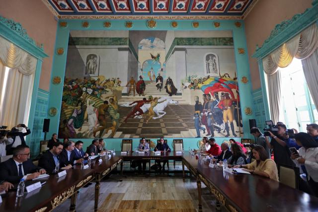 Jorge Arreaza (C-R), president of the Special Commission for the Development and Implementation of Mechanisms for the Amnesty Law for Democratic Coexistence, speaks during a meeting at the National Congress headquarters in Caracas on February 24, 2026. (Photo by Pedro MATTEY / AFP)
