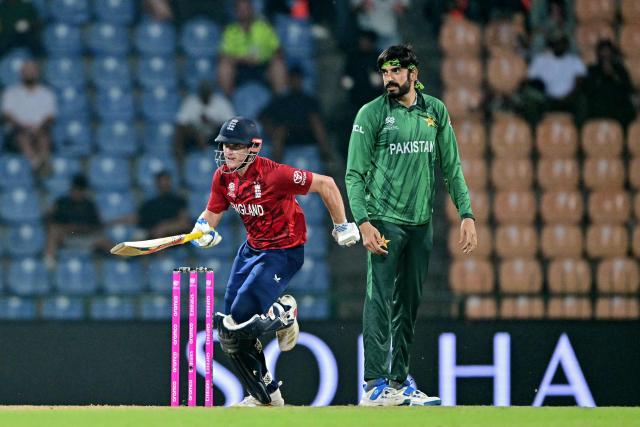 England's captain Harry Brook (L) runs between the wickets as Pakistan's Usman Tariq looks on during the 2026 ICC Men's T20 Cricket World Cup Super Eights match between England and Pakistan at the Pallekele International Cricket Stadium in Kandy on February 24, 2026. (Photo by Ishara S. KODIKARA / AFP)