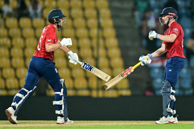 England's Will Jacks (L) and captain Harry Brook gesture during the 2026 ICC Men's T20 Cricket World Cup Super Eights match between England and Pakistan at the Pallekele International Cricket Stadium in Kandy on February 24, 2026. (Photo by Ishara S. KODIKARA / AFP)