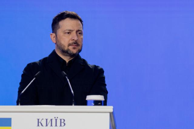 Ukraine's President Volodymyr Zelensky attends a press conference in Kyiv on February 24, 2026, as Ukraine marks the fourth anniversary of Russia's invasion. EU chief said on February 24, 2026 the bloc would make good on a 90-billion-euro ($106-billion) loan for Ukraine despite the Kremlin-friendly leader of Hungary, Viktor Orban, blocking the measure. (Photo by Tetiana DZHAFAROVA / AFP)