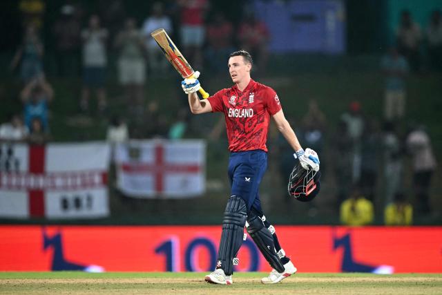 England captain Harry Brook celebrates his century (100 runs) during the 2026 ICC Men's T20 Cricket World Cup Super Eights match between England and Pakistan at the Pallekele International Cricket Stadium in Kandy on February 24, 2026. (Photo by Dibyangshu SARKAR / AFP)
