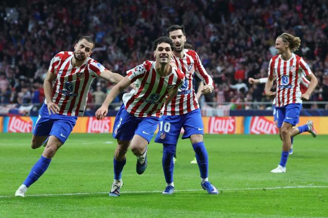 Atletico Madrid's US midfielder #05 Johnny Cardoso (2L) celebrates scoring his team's second goal during the UEFA Champions League knockout round play-off second leg football match between Club Atletico de Madrid and Club Brugge KV at Metropolitano Stadium in Madrid on February 24, 2026. (Photo by Pierre-Philippe MARCOU / AFP)