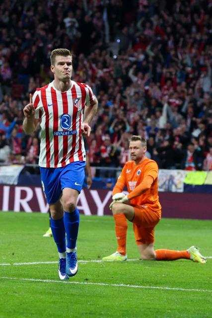 Atletico Madrid's Norwegian forward #09 Alexander Sorloth celebrates scoring his team's third goal during the UEFA Champions League knockout round play-off second leg football match between Club Atletico de Madrid and Club Brugge KV at Metropolitano Stadium in Madrid on February 24, 2026. (Photo by Pierre-Philippe MARCOU / AFP)