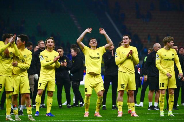 Bodo/Glimt's Norwegian defender #06 Jostein Gundersen (C) celebrates with teammates at the end of the UEFA Champions League second-leg play-off football match between Inter Milan and Bodo/Glimt at San Siro stadium in Milan, northern Italy, on February 24, 2026. (Photo by PIERO CRUCIATTI / AFP)