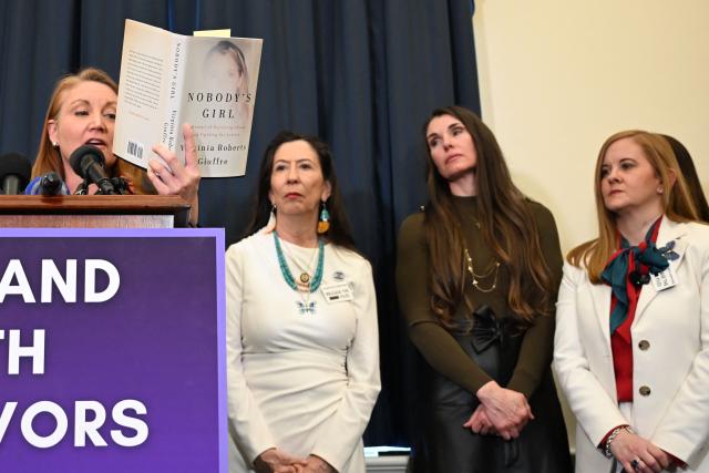 US Representative Melanie Stansbury, Democrat from New Mexico, holds the book "Nobody's Girl" by the late Virginia Giuffre as she speaks during a press conference with survivors of convicted sex offender Jeffrey Epstein, held by the Democratic Women's Caucus on Capitol Hill ahead of the State of the Union address by President Donald Trump in Washington, DC, on February 24, 2026. (Photo by Alex Wroblewski / AFP)