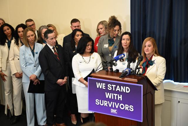 Liz Stein (R), accuser of convicted sex offender Jeffrey Epstein, speaks during a press conference held by the Democratic Women's Caucus on Capitol Hill ahead of the State of the Union address by President Donald Trump in Washington, DC, on February 24, 2026. (Photo by Alex Wroblewski / AFP)