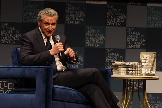 California Governor Gavin Newsom speaks with Harry Sisson to promote his book, "Young Man in a Hurry" at the Streicker Cultural Center, in New York, on February 24, 2026. (Photo by TIMOTHY A. CLARY / AFP)