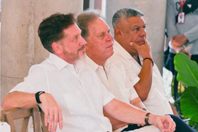 The President of CONMEBOL Alejandro Dominguez (L), President of the Colombian Football Federation (FCF) Ramon Jesurum, and President of the Argentine Football Association (AFA) Claudio Tapia are seen during the visit of FIFA President Gianni Infantino to the new Concentration Hotel of the Colombian Football Federation in Barranquilla, Colombia, on February 24, 2026. FIFA boss Gianni Infantino told AFP on February 24, 2026, he was "very reassured" about Mexico's hosting of games in the World Cup, in his first comments on the violence triggered by the killing of a drug cartel leader. (Photo by David SALAZAR / AFP)