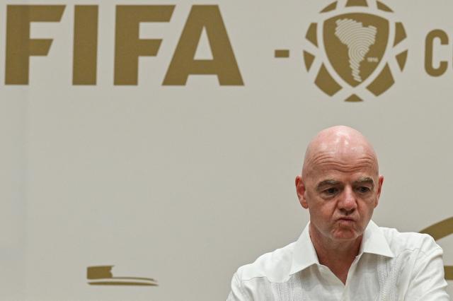 FIFA President Gianni Infantino gestures during his visit to the new Concentration Hotel of the Colombian Football Federation in Barranquilla, Colombia, on February 24, 2026. FIFA boss Gianni Infantino told AFP on February 24, 2026, he was "very reassured" about Mexico's hosting of games in the World Cup, in his first comments on the violence triggered by the killing of a drug cartel leader. (Photo by David SALAZAR / AFP)