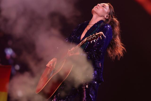 Mexican singer Jesse Huerta, of pop duo Jesse & Joy, performs on stage during the 65th Vina del Mar International Song Festival in Vina del Mar, Chile, on February 24, 2026. (Photo by Javier TORRES / AFP)