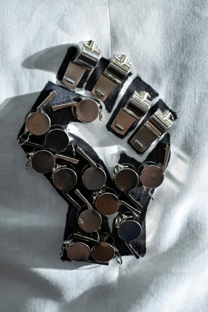 Detail of a pin on a Democratic Congresswoman's attire before US President Donald Trump delivers the first State of the Union address of his second term to a joint session of Congress in the House Chamber of the United States Capitol in Washington, DC, on February 24, 2026. (Photo by Kenny HOLSTON / POOL / AFP)